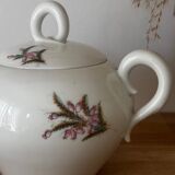 Beautiful vintage porcelain sugar bowl with a floral pattern.