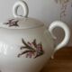 Beautiful vintage porcelain sugar bowl with a floral pattern.