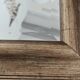 Beveled mirror under gold frame