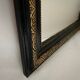 Miroir Napoleon III, noir et or avec fronton 75x112cm