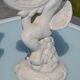Pair of "cherub" candle holders in plaster
