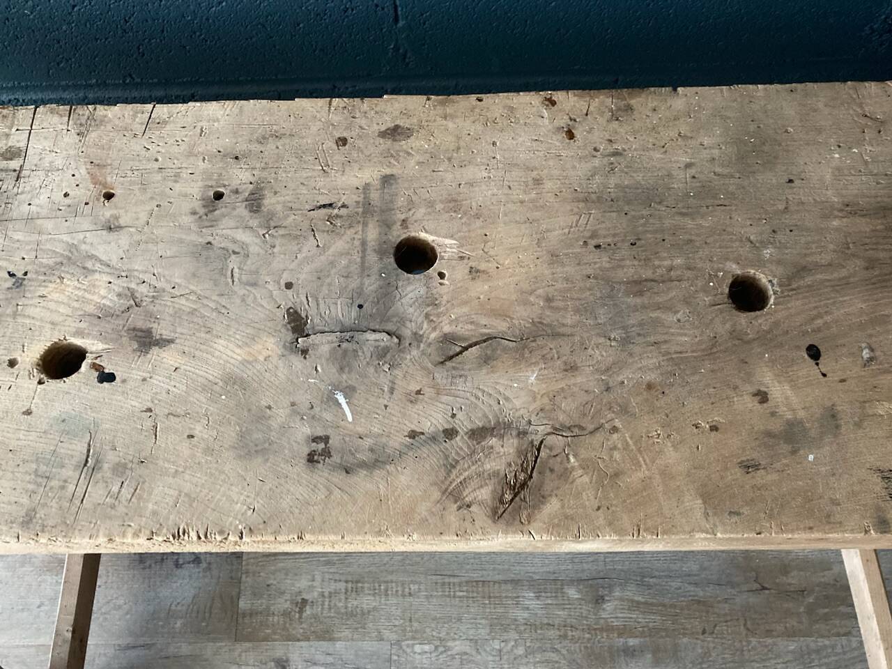 Old workbench with inclined legs