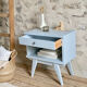Compass leg bedside table