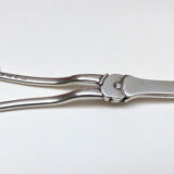 Silver metal grape chisel with punches