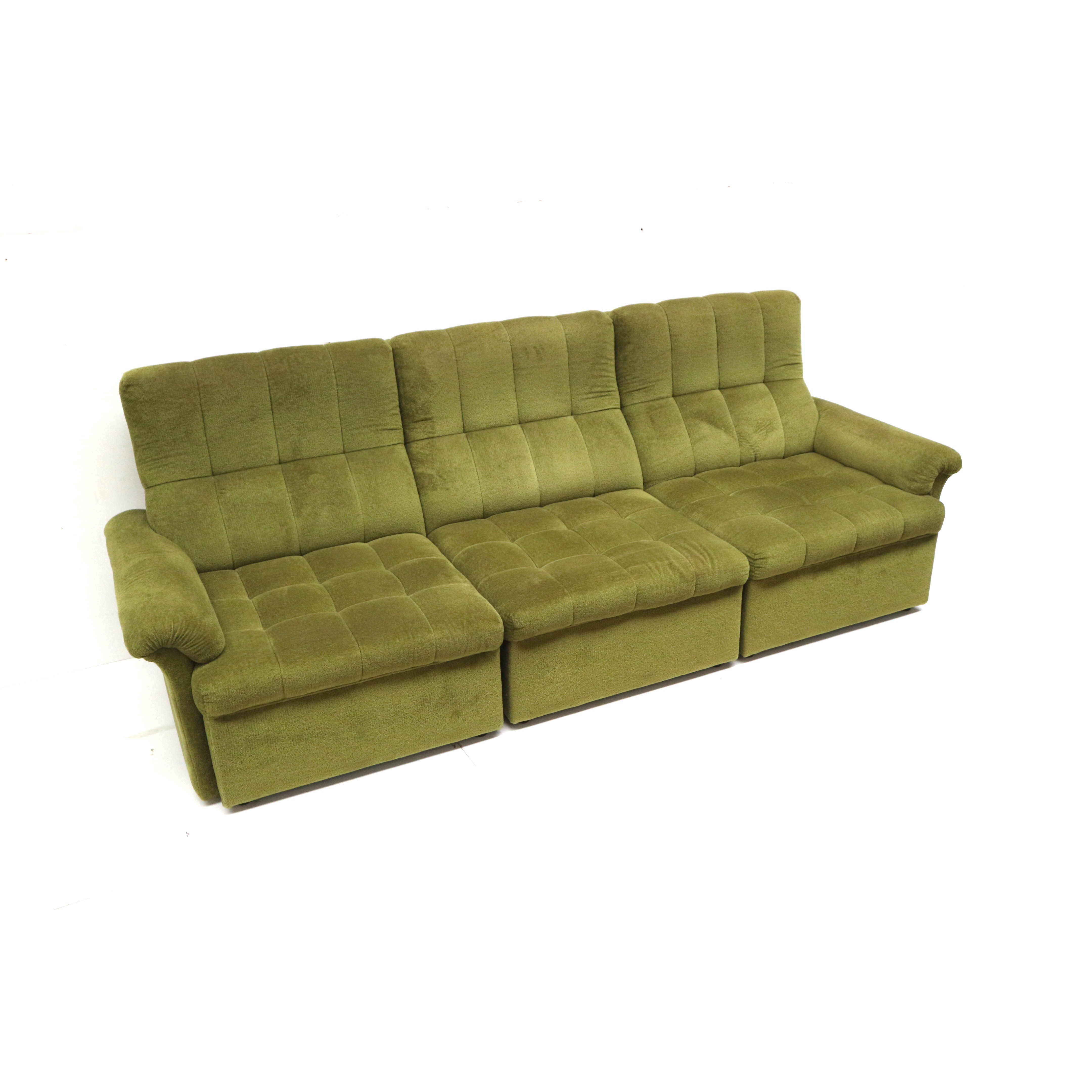 Green velvet vintage element sofa made in the 1970s