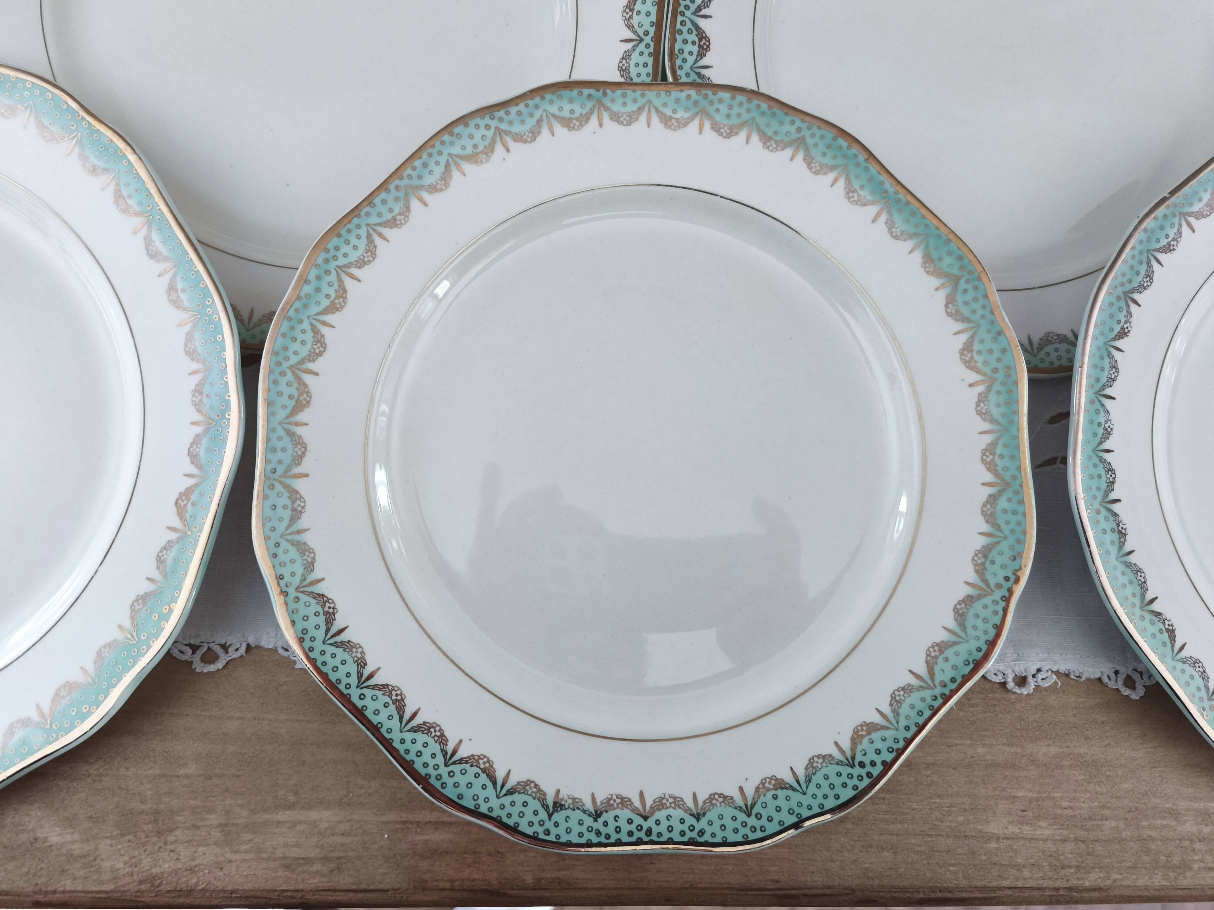 Set of 11 Longwy France earthenware dinner plates, Trianon model