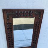 Miroir en tech ancien sculpté