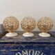 Trio of golden globe wall or ceiling lights