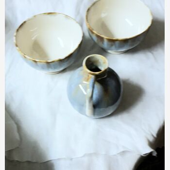 Set bowls and flaming ceramic pot 