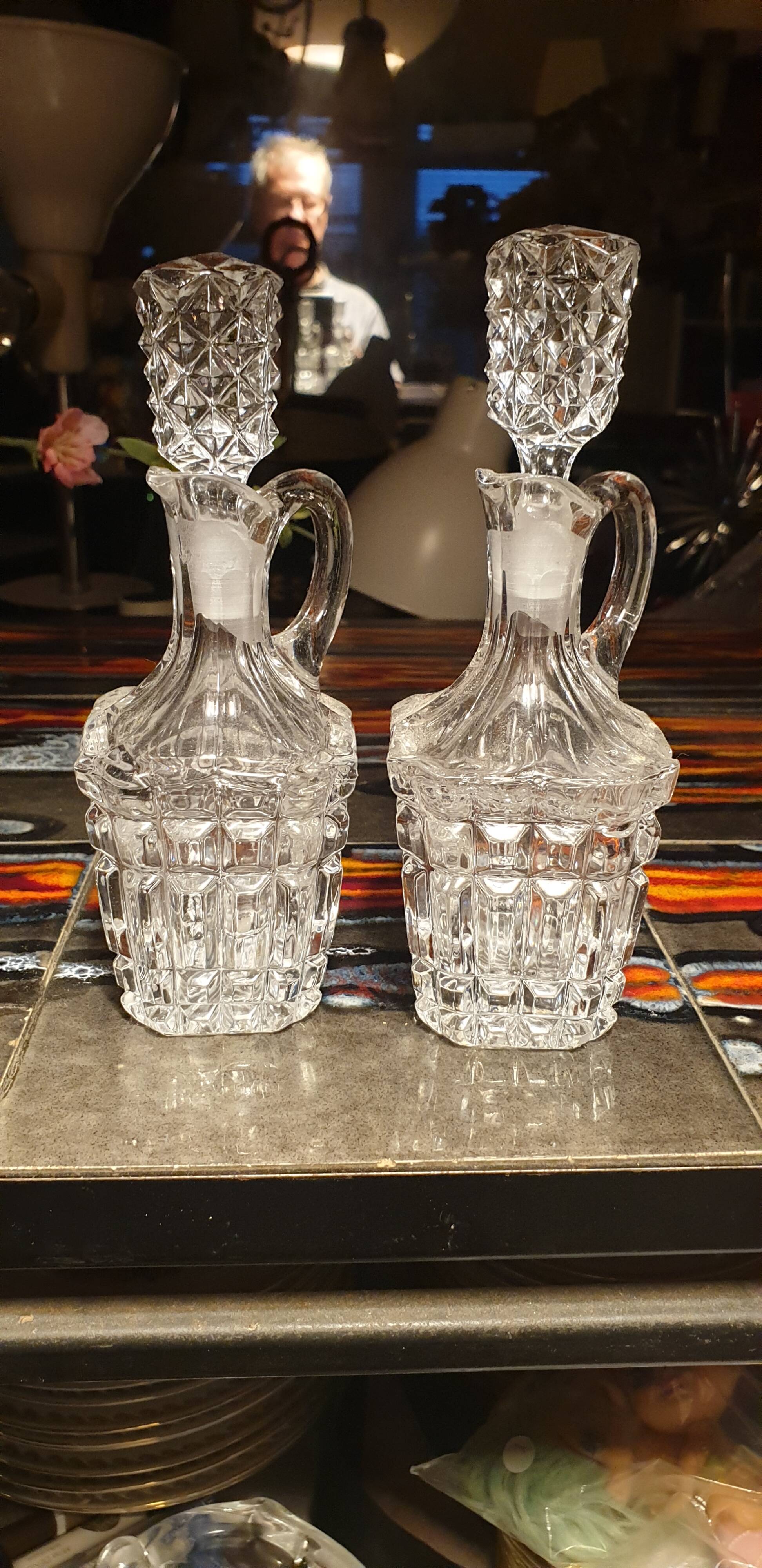 Pair of cut crystal bottles