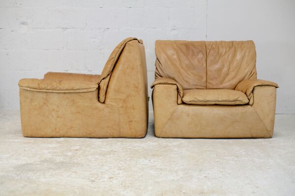 Paire de fauteuils cuir caramel