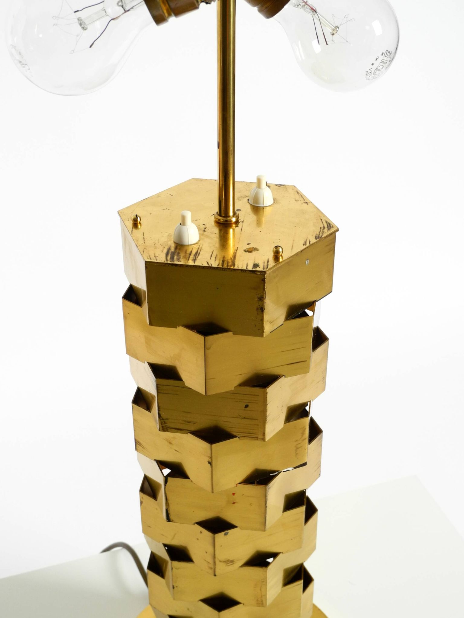 1960s brass table lamp by Vereinigte Werkstätten with an illuminated base