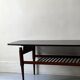 Danish teak coffee table with a double top, 1950s design.