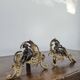 Pair of bronze fire dogs in the Louis XV style