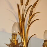 Golden metal wall sconce