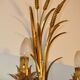 Golden metal wall sconce