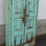 Old wooden cabinet with beautiful green patina
