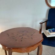 Flying table in Louis XV style with floral marquetry and bronze fittings.