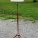 Vintage tripod floor lamp from the 60s in wood and brass