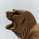 Articulated wooden lion