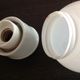 Vintage globe wall lamp in white opaline with white ceramic base