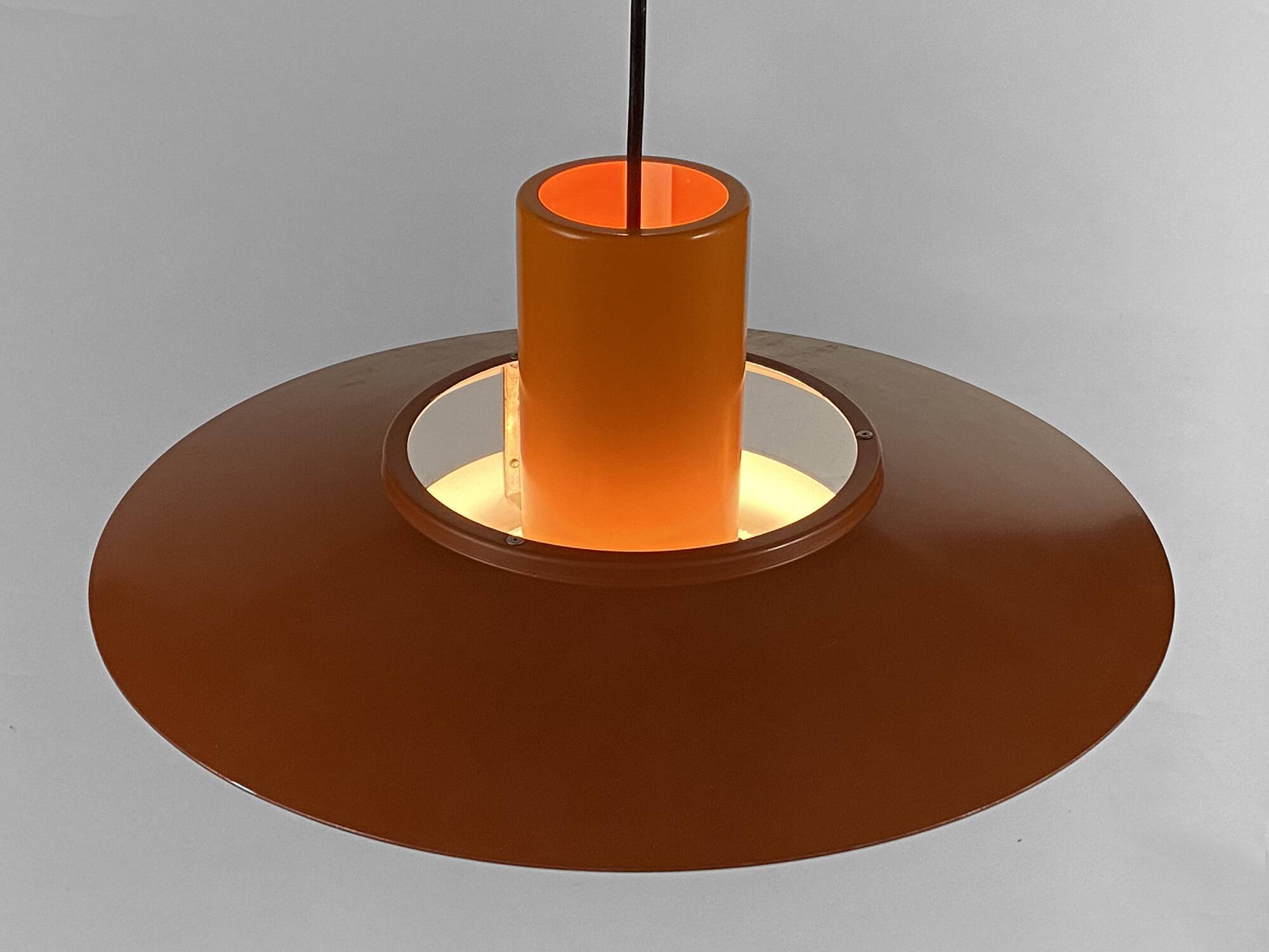 Pendant light "Falcon" two tone orange by Andreas Hansen for Fog & Mørup. Denmark 1960s.