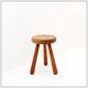 Brutalist tripod stool in solid wood, around 1960.