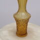 Yellow glass vase streaked and flared
