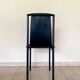 4 postmodern design chairs in black metal and leather, 1980's