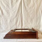 Old carved wooden medicine cabinet with beveled mirror