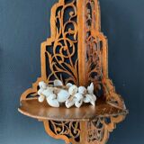 Old wall corner shelf in cut wood from the 1900s