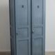 Vintage grey wooden wardrobe from 1914.