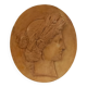 Plaster medallion, high relief, yellow ochre patina, representing the Roman divinity Ceres