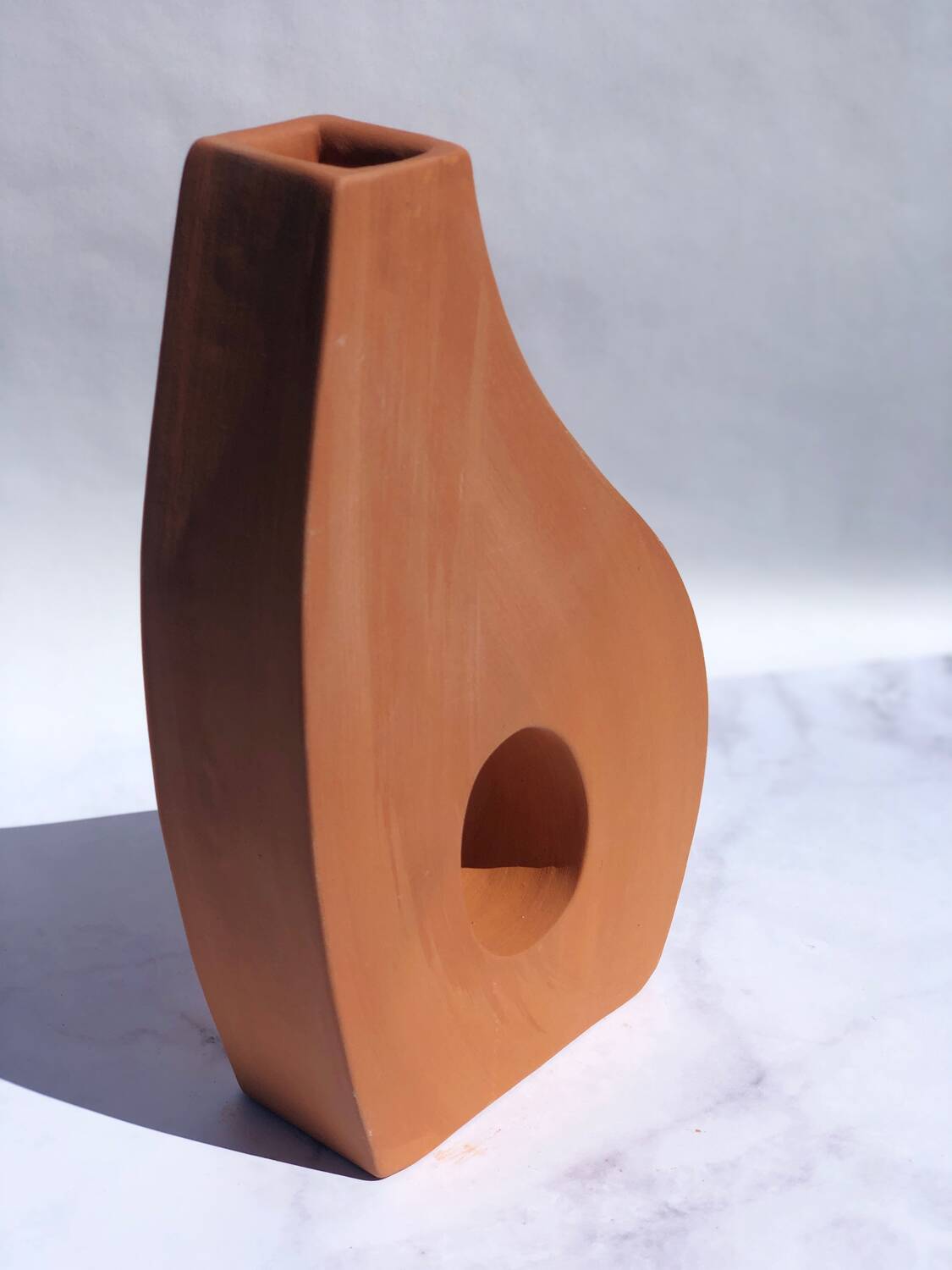 Handmade red earthenware flat vase