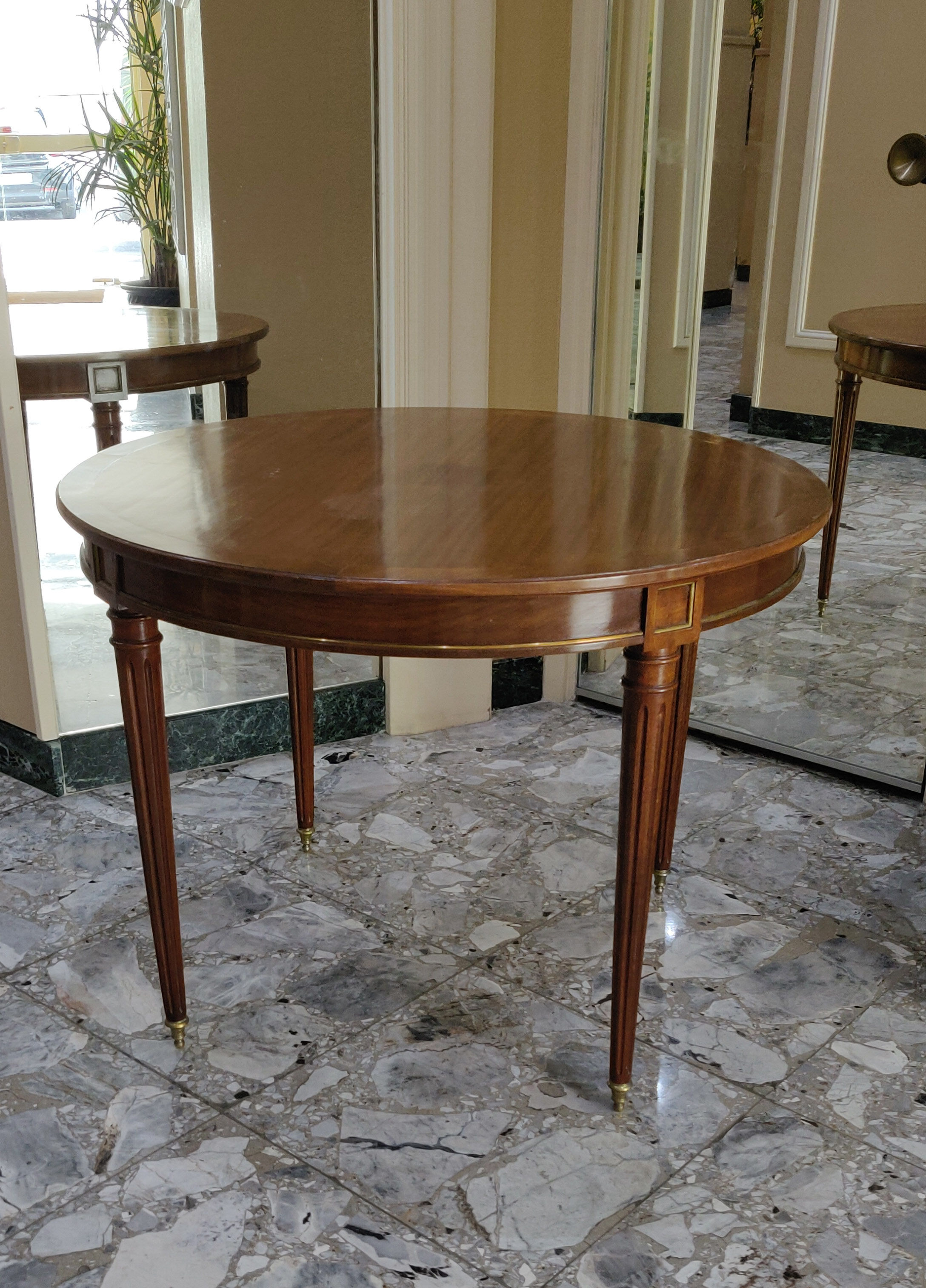 Louis XVI dining table in cherry and bronze