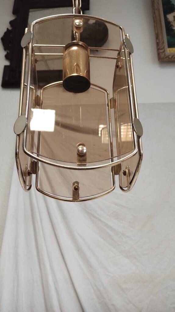 Suspension in gold metal and smoked glass