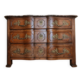 Commode Arbalette d'époque Régence en noyer, marbre et bronzes