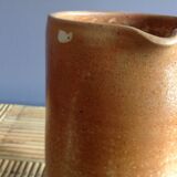 Pitcher in water in sandstone