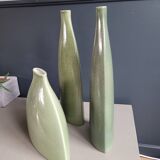 Trio of green enamelled vases