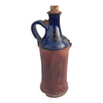 Signed terracotta bottle