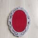 Louis XVI style patinated oval mirror
