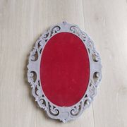 Louis XVI style patinated oval mirror