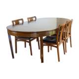 Table with 2 extensions and its chairs