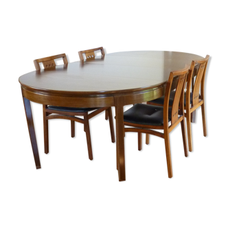 Table with 2 extensions and its chairs