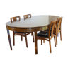Table with 2 extensions and its chairs