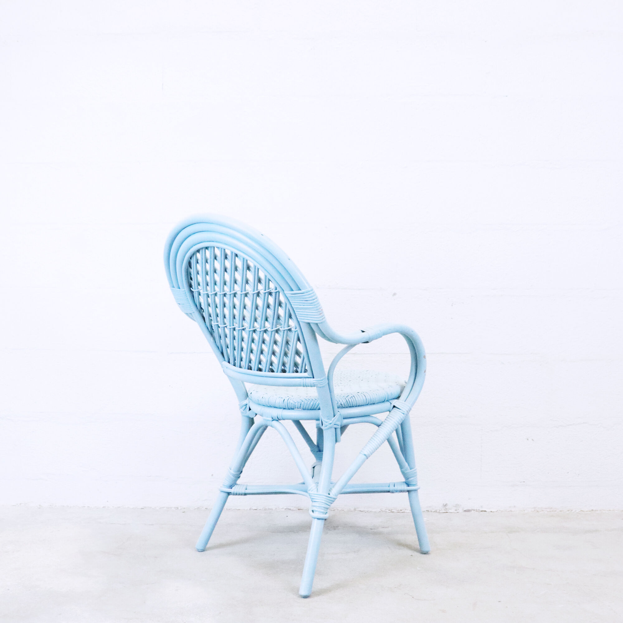 Nordic blue braided rattan armchair
