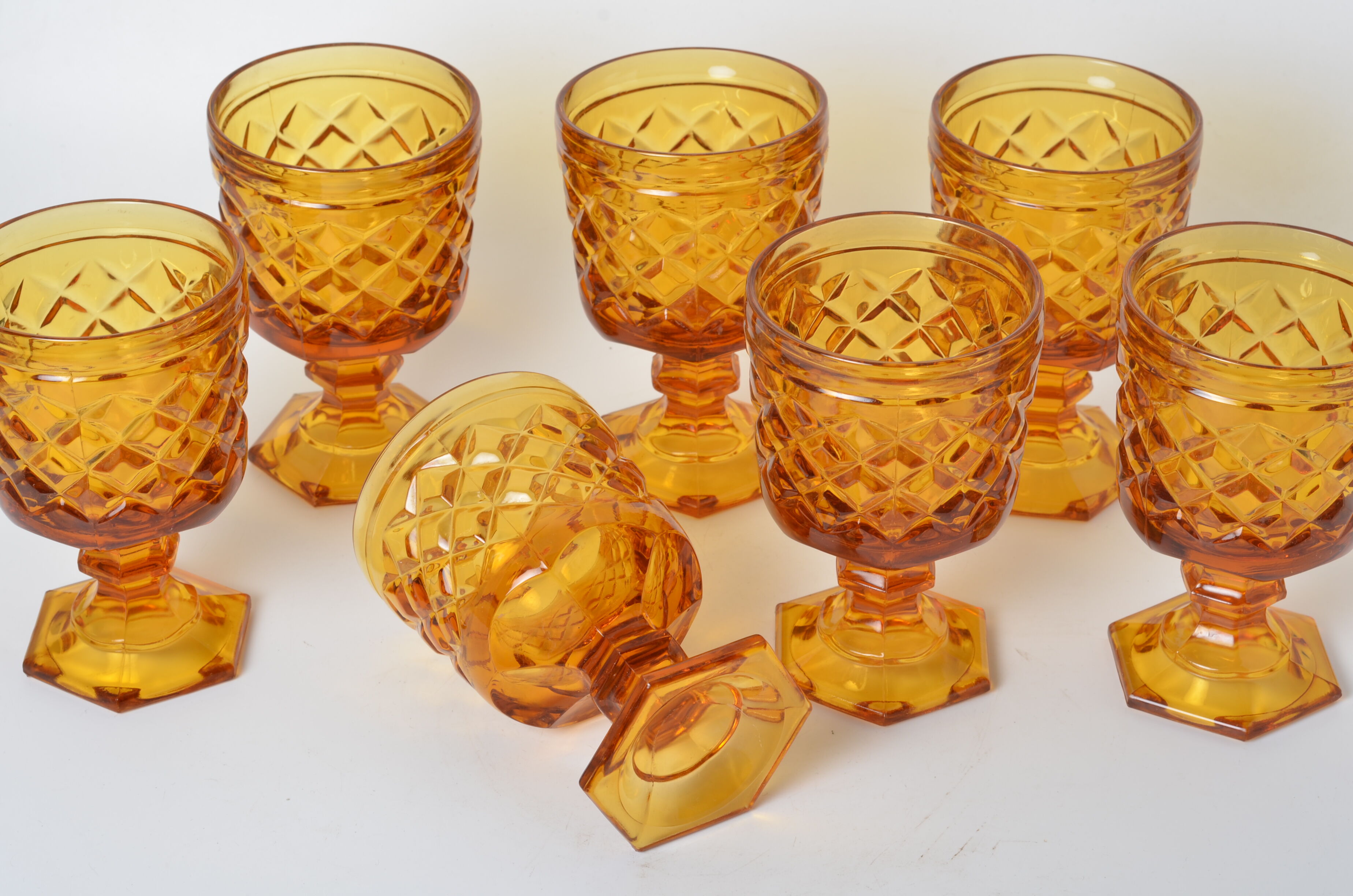 7 amber stemmed glasses