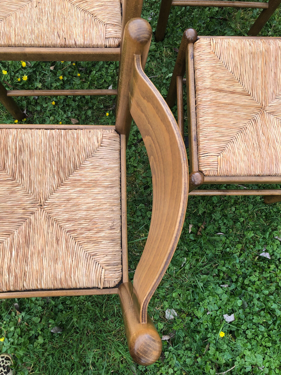 4 wood and straw chairs