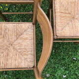 4 wood and straw chairs