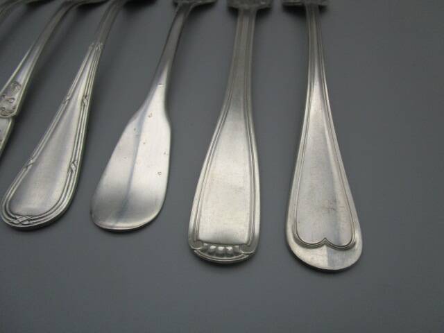 6 mismatched old silver metal forks for a chic table